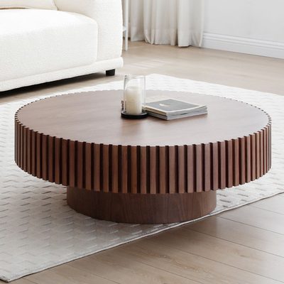 Ansel Round Pedestal Coffee Table with Ribbed Detailing