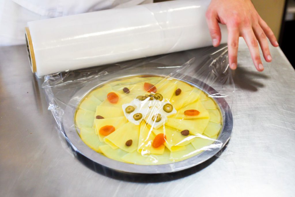 Covering food with cellophane tape