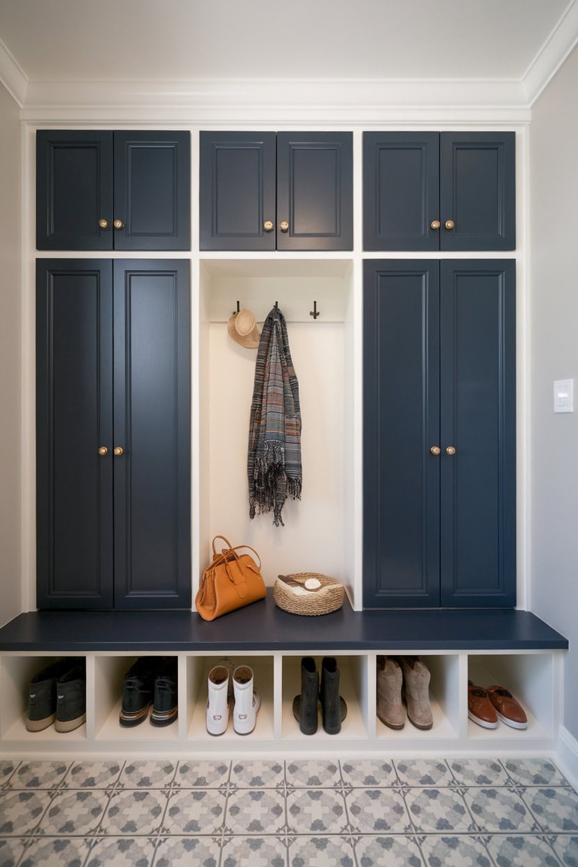 Two-tone mudroom lockers with upper and lower doors in navy blue and white