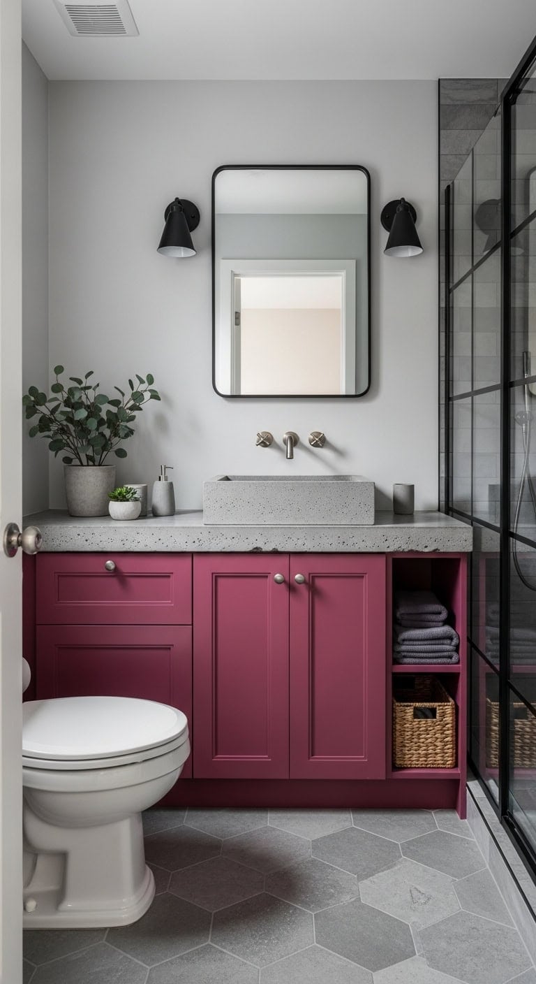 sophisticated industrial raspberry concrete bathroom